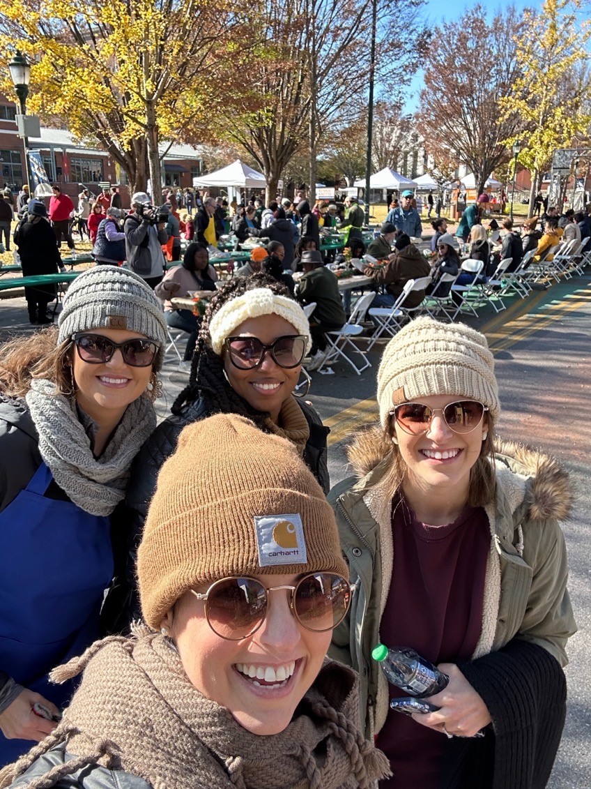 Lindsey Ledford, Safiya Pulliam, Katlyn Fuhrwerk, and Jamie Smith volunteer for Gratefull, a free community-wide Thanksgiving lunch in downtown Chattanooga.